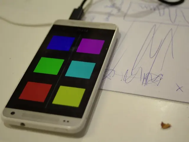 In this image, we can see a white color table, on that table there is a mobile phone which is...