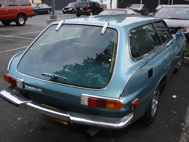 In this image there is a parking are in that area cars are parked.