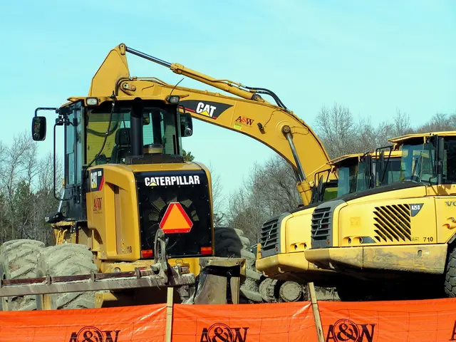 As we can see in the image. In the front there is yellow color crane. In the background there are...