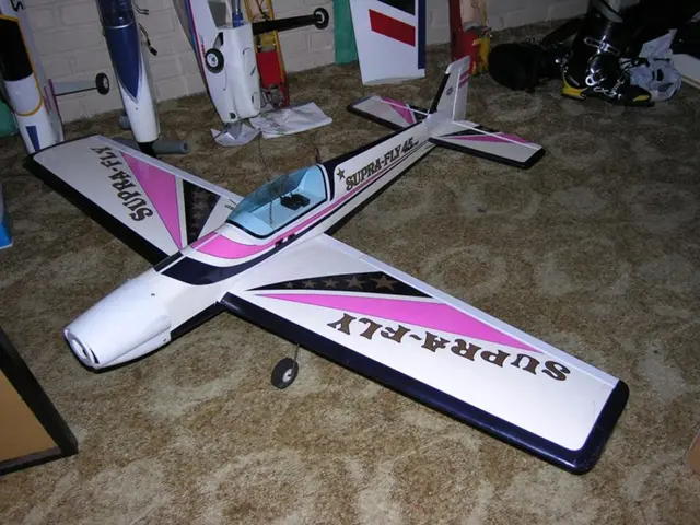 In this image there are toy airplanes and on the right side there is a leg of the person visible...