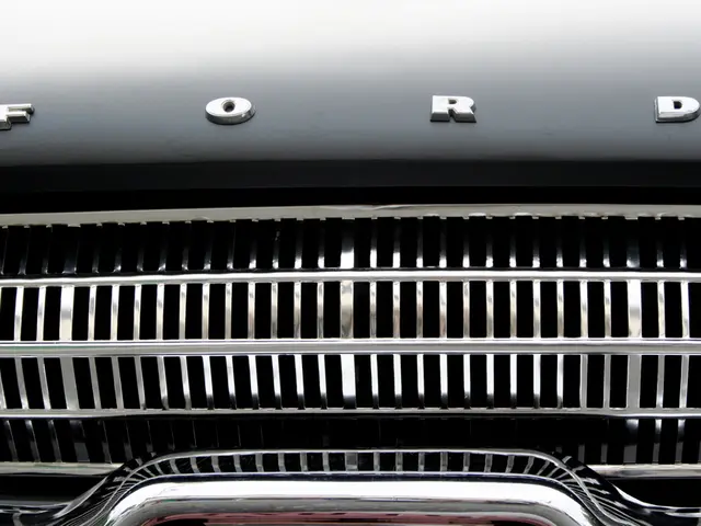 It is the picture of a ford car,only the partial front part of the car is visible in the image.